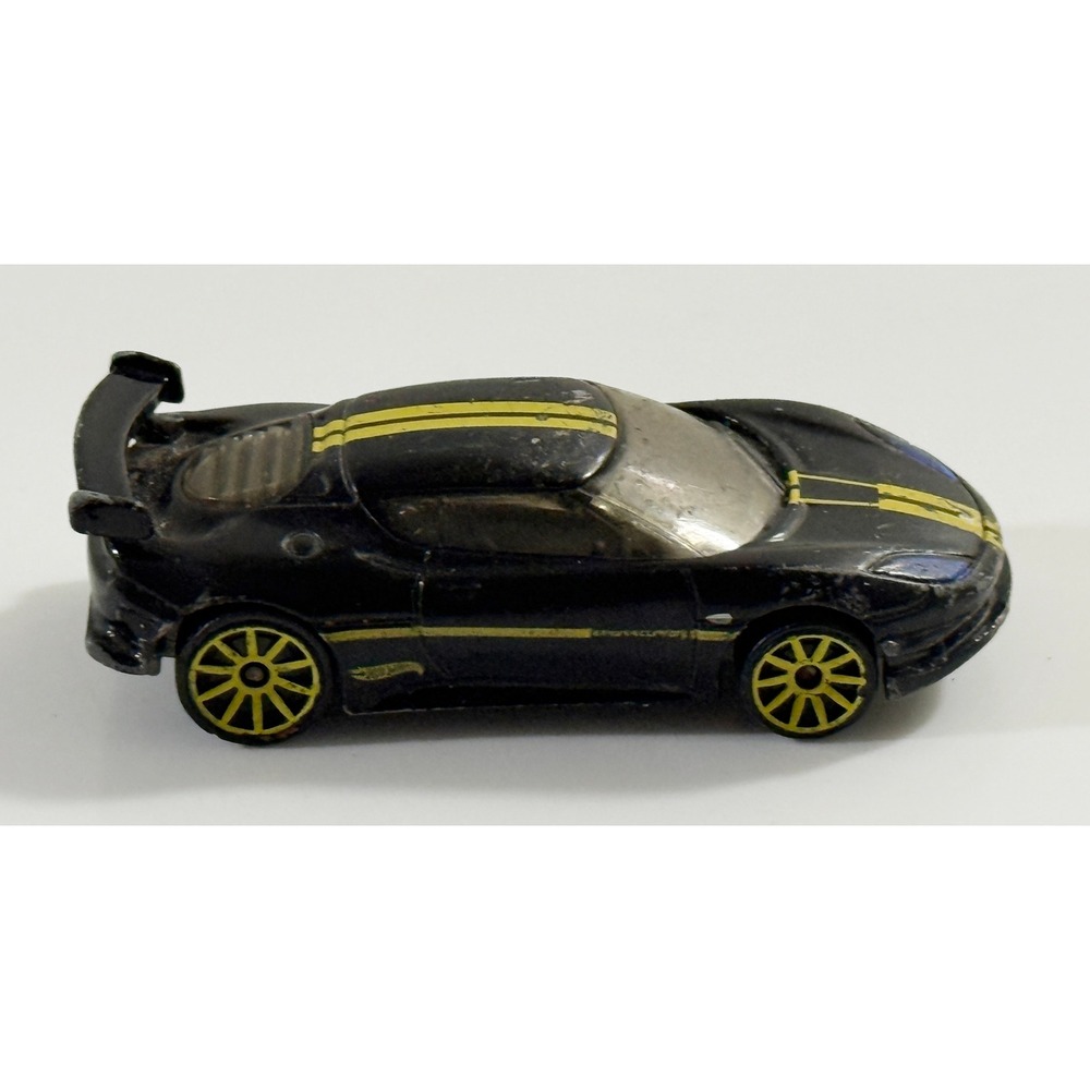 Hot Wheels Lotus Evora GT4 1:64 Black Yellow Racing Stripes HW Showroom 2013
